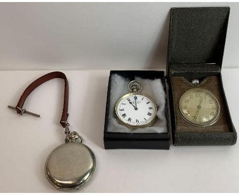 An R. N. I. B. braille pocket watch, metal hunter cased; a metal cased open faced pocket watch; and a 1930s travelling clock