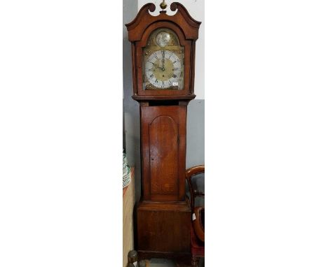 An oak cased longcase clock, the dial silver and brass dial signed Edw. How Holford 