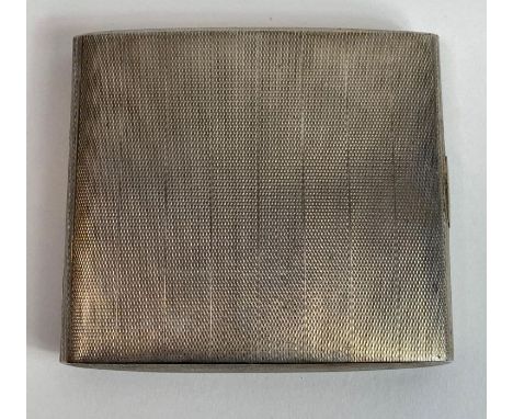 A silver cigarette case, engine turned decoration, 147 g (4.7 troy ozs) gross