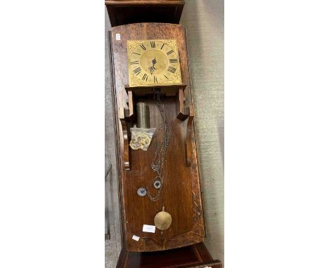 An oak cased wall clock, with brass dial by " B Anns, Highworth" with weights and pendulum 
