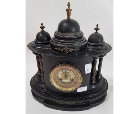 A 20th century slate mantel clock with an eight day movement, Roman numerals to the dial