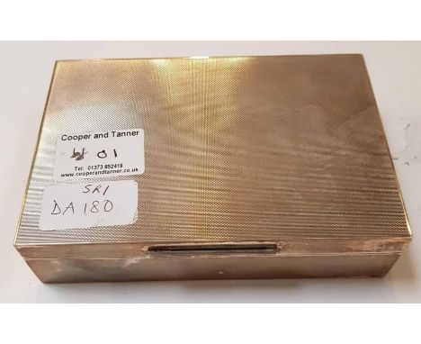 A silver cigarette box, London 1967, with engine turned cover, wooden lined, 15.2 cm long