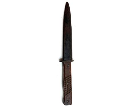 A German boot knife with grooved wooden grip, pointed single edge blade and in black painted metal scabbard, blade 15cms