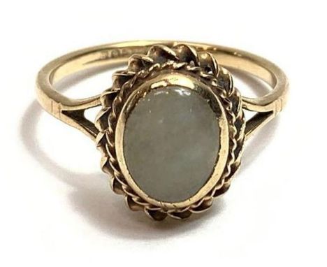 A 9 carat gold jade set ring, finger size M, 2.2 grams gross