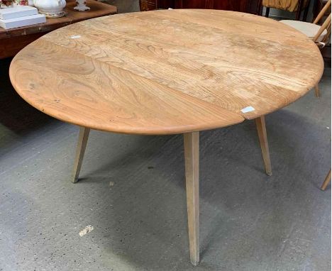 An Ercol drop leaf table on splayed legs, 69cm high, 114cm wide, along with four chairs 