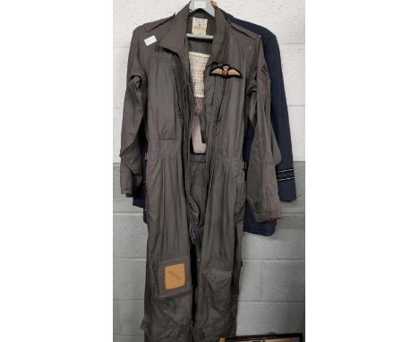 A 1964 RAF jumpsuit, size 7, along with two RAF jackets, two pencil drawings, photograph and boots