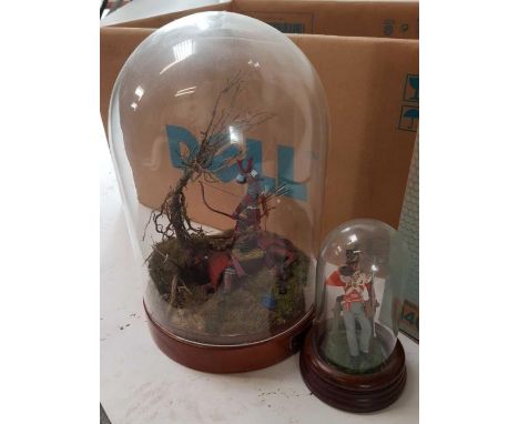 A large collection of painted model soldiers, some in glass domes 