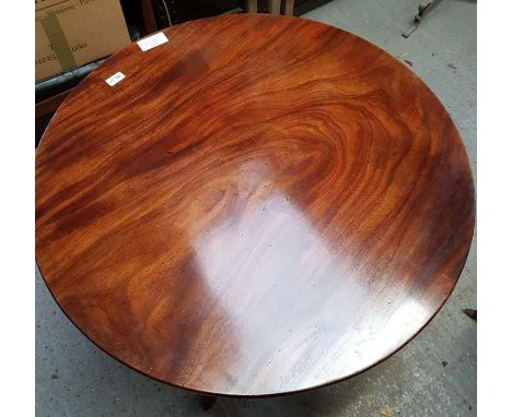 A19th century mahogany tilt top table, standing on a tripod base, 71cm high, 84cm diameter 