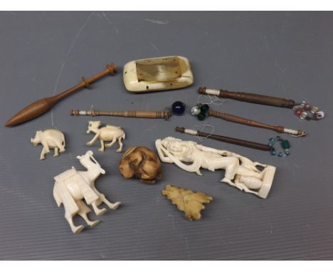 Tub: assorted bone carved figures to include camel, horn snuff box, sewing bobbins, composition rabbit Netsuke etc (qty) 
