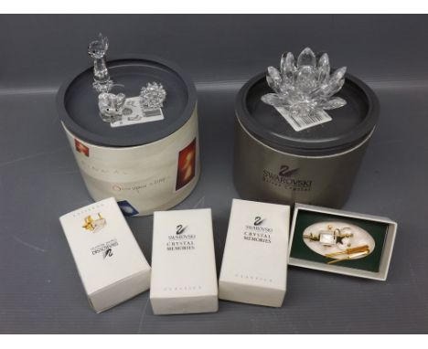 Seven items of Swarovski crystal to include a miniature model gramophone, miniature and gold plated mounted grand piano, vint