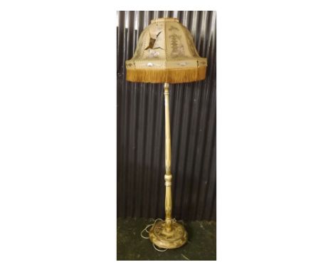 Early 20th century standard lamp with cream and gilt decoration in chinoiserie style, the matching shade A/F  