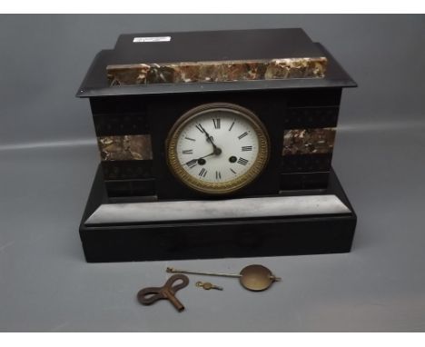 Black slate and marble fronted mantel clock, with enamelled Arabic chapter ring, together with key and pendulum, 14ins wide x