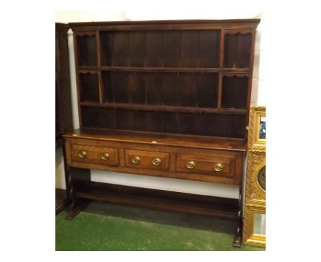 18th century oak Welsh dresser, top fitted with open front and panelled back with two fixed shelves, with steel made fitted h