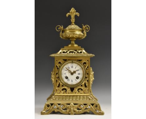 A late 19th century French gilt-brass mantel clock, 8cm white enamel dial with Roman and subsidiary Arabic numerals, twin-win