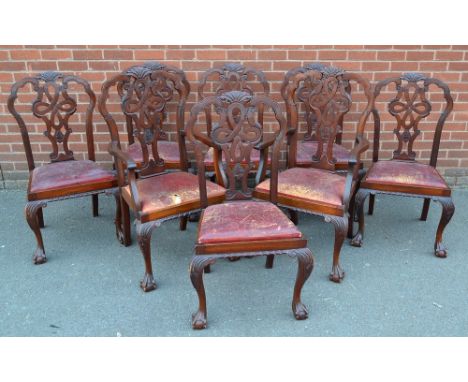 A Chippendale Revival mahogany oval dining table, moulded top with gadrooned border, cabriole legs carved with acanthus, ball