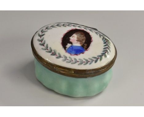 A George III South Staffordshire enamel patch box, the hinged cover painted with a gentleman of fashion in profile, within a 