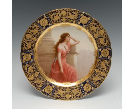 A Vienna shaped circular cabinet plate, Sehnsucht (Nostalgia), with a beauty looking longingly, the cobalt blue border applie