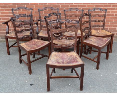 A set of eight George III revival mahogany dining chairs, comprising six side chairs and a pair of carvers, serpentine ladder