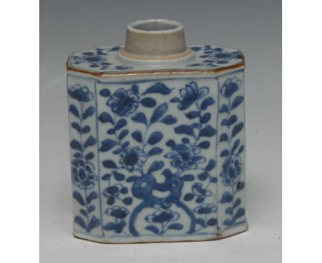 An 18th century Chinese porcelain canted rectangular tea caddy, painted in underglaze blue with stylized foliage, ochre line 