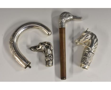 A Continental equine novelty silver walking cane handle, cast as a horse's head, above a frieze of dense foliage, stamped 900