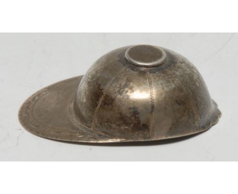 A George III silver caddy spoon, as a horse jockey cap, bright engraved peak, 5cm long, rubbed maker's mark, London 1810