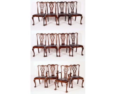 A set of twelve Chippendale revival mahogany dining chairs, comprising ten side chairs and a pair of carvers, shaped cresting