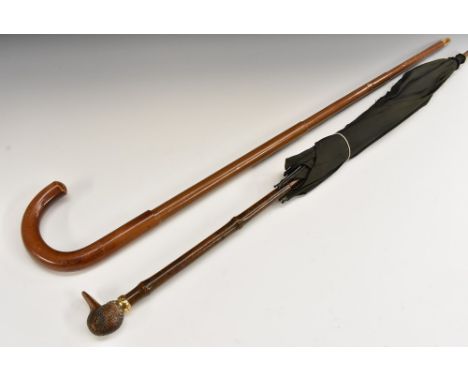 A 19th century lady's parasol, by Brigg of London, stamped, the walnut grip well-carved as duck's head and applied with glass