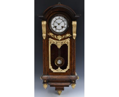 A late 19th century Austrian walnut and gilt-metal mounted wall clock, 9.5cm white enamel chapter ring inscribed with Roman n