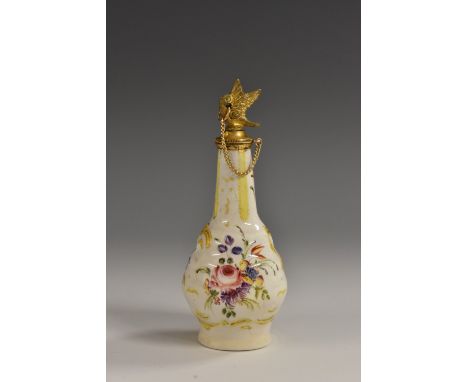 An early George III Bilston enamel baluster scent bottle, painted with sprays of Deutsche Blumen on a white ground, raised an