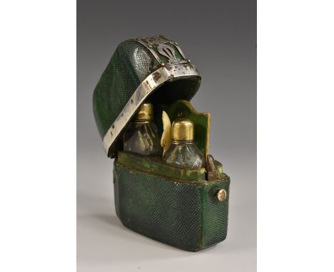 An 18th century lady's silver-mounted shagreen rounded square scent etui, the hinged cover enclosing a graduating pair of sil