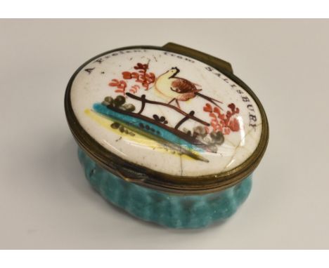 A George III South Staffordshire enamel oval patch box, hinged cover painted in polychrome with a fanciful bird perched on a 