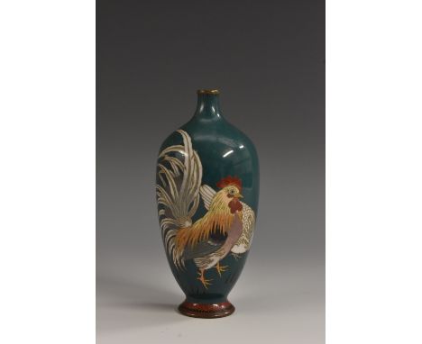 A small Japanese cloisonné enamel ovoid cabinet vase, decorated in polychrome enamels with two hens on a green ground, scroll