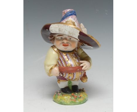 A Derby Mansion House dwarf, standing, wearing a broad brimmed hat, floral fancy shirt, brown sash, shaped circular base, 17c