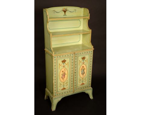 A 19th century painted waterfall bookcase/cabinet, three quarter gallery above three graduated shelves, the base with a pair 