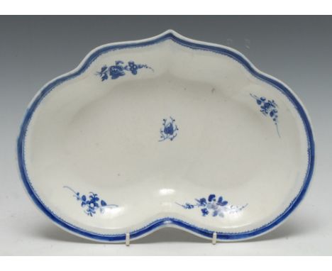 A Caughley heart shaped dish, sparsely decorated with flowers and foliage, bluie line rim, 27cm wide, Salopian mark, c.1790