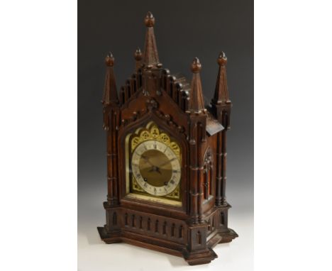 A Victorian Gothic Revival oak bracket clock, 16.5cm shaped ogee brass dial with silvered chapter ring inscribed Thomas Yates