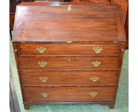 A George III mahogany bureau, fall front enclosing a fitted satinwood interior with small drawers, pigeon holes and a central