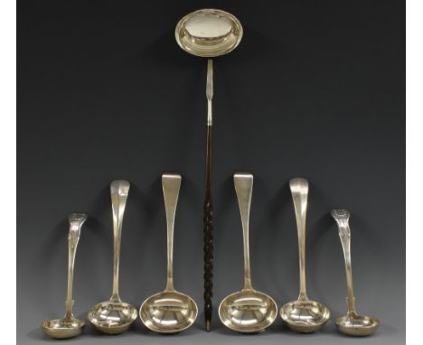 A pair of Victorian Scottish silver single-struck King's pattern sauce ladles, James McKay, Edinburgh 1863; others pairs, var