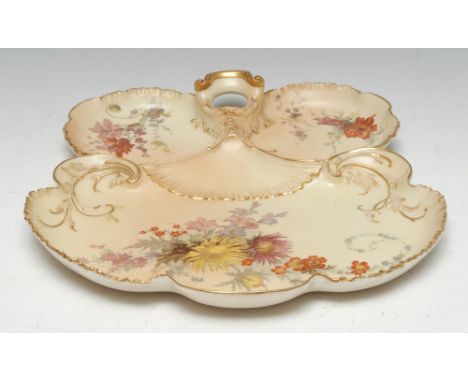 A Royal Worcester scallop shaped tray, printed and painted with colourful flowers on a blush ivory ground, shells and scrolli