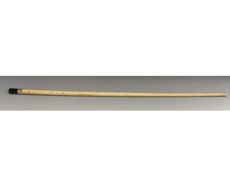 A 19th century sailor's maritime souvenir walking stick, baleen handle, white metal ferrule, whalebone shaft, 84cm long      