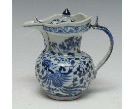 A Chinese libation ewer, of small proportions, painted in underglaze blue with ho-ho birds and scrolling foliage, kendi-shape