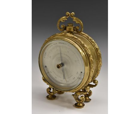 A 19th century gilt brass drum shaped holosteric mantel barometer, 8.5cm silvered register with curved mercury thermometer, t