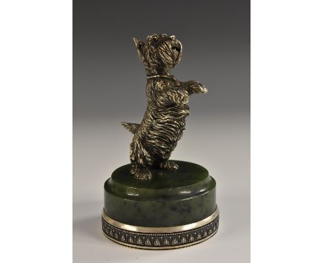 A Russian silver and nephrite jade model, of a rearing Scottish terrier, turned plinth outlined with a silver beaded anthemio