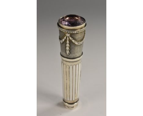 A Austrian Neoclassical silver and enamel walking cane handle, surmounted by a faceted amethyst-coloured stone, cast with a f