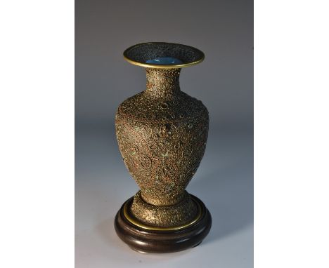 A 19th century Chinese filigree, enamel and brass baluster vase, decorated with scrolling leafy foliage throughout, turquoise