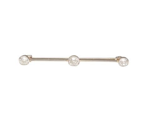 millegrain set with three graduated oval cushion-cut diamonds, to a plain knife bar, unmarked(Length: 50mm)