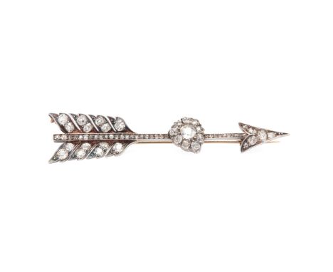 modelled as an arrow and pierced heart, set throughout with graduated old round and eight-cut diamonds, unmarked(Width: 78mm)