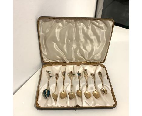 A group of eight Norwegian silver-gilt and plique-a-jour enamel coffee or demitasse spoons, six by Marius Hammer, 830 and 900