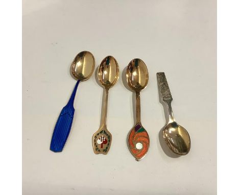 A group of three Danish sterling silver and enamel Christmas year spoons by A. Michelsen, Copenhagen, comprising: 1951, the h