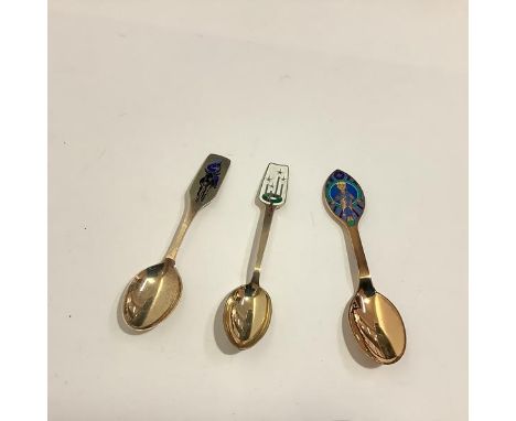 A group of three Danish sterling silver and enamel Christmas spoons by A. Michelsen, Copenhagen, comprising: 1984, designed b